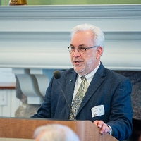 Alumni giving speech